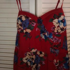 Sun dress. Fitted on top then lose from bust down